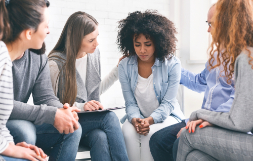 Woman in a group therapy session