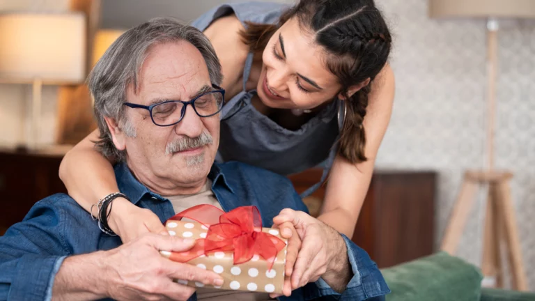 giving a gift to a father in recovery