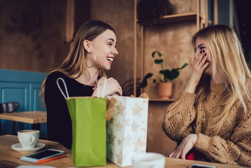 friend giving gift to friend in recovery