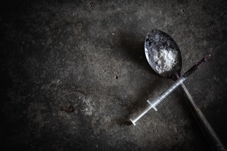 needle and heroin or cocaine powder